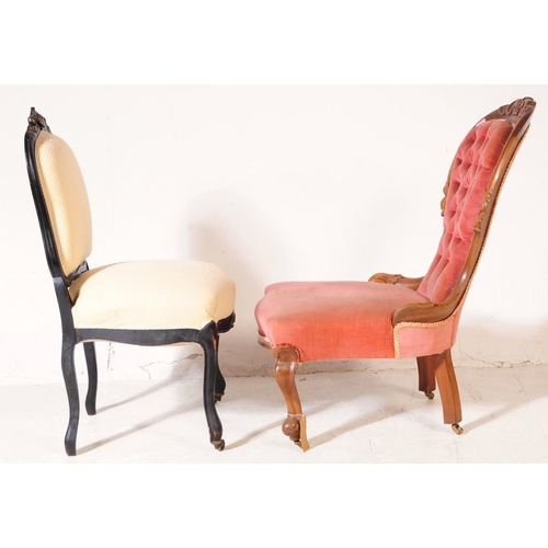 996 - A 19th century Victorian walnut ladies spoon back nursing chair, alongside another. The chair having... 