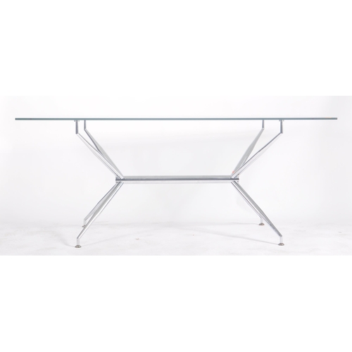 605 - British Modern Design - A large retro 20th century glass & chrome dining table. The table having a r... 