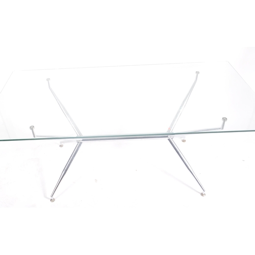 605 - British Modern Design - A large retro 20th century glass & chrome dining table. The table having a r... 