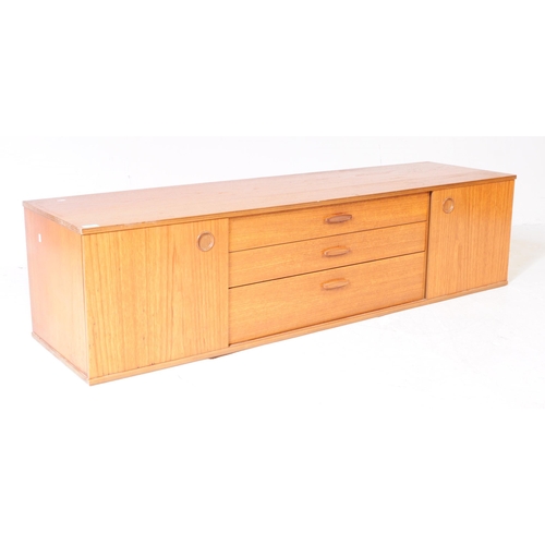 665 - Avalon - A retro mid 20th century teak Ladderax shelving wall system. The two sideboard cabinets of ... 