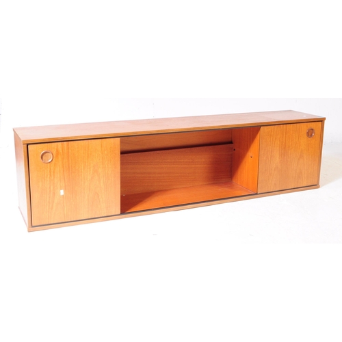 665 - Avalon - A retro mid 20th century teak Ladderax shelving wall system. The two sideboard cabinets of ... 