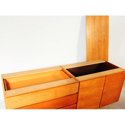 669 - Beaver & Tapley - A 20th century beech wood modular sideboard. The sideboard featuring a bank of dra... 