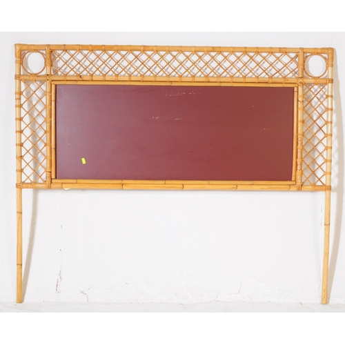 675 - A vintage circa 1970s bamboo double headboard. The headboard having bamboo trellis type frame with c... 