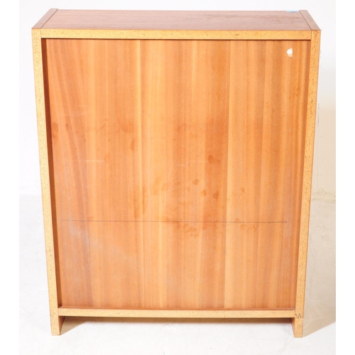 676 - British Modern Design - A mid 20th century circa 1970s teak open bookcase display case. The bookcase... 