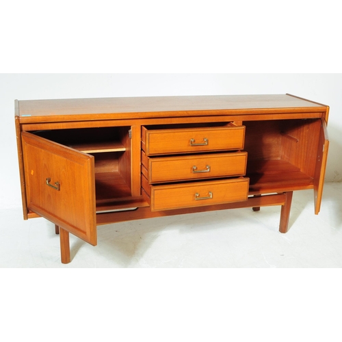 679 - British Modern Design - A retro mid 20th century teak sideboard credenza. Rectangular form with a ba... 