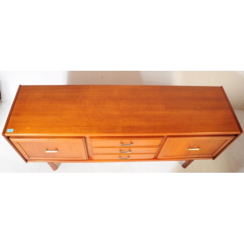 679 - British Modern Design - A retro mid 20th century teak sideboard credenza. Rectangular form with a ba... 