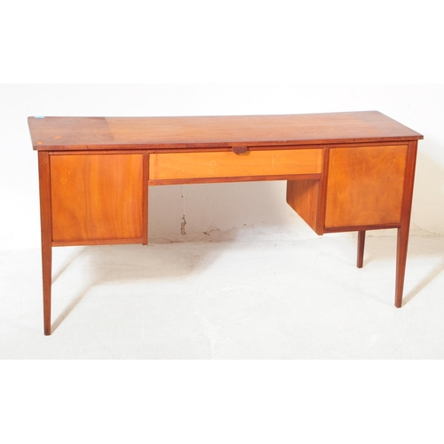 680 - Younger Furniture - A 20th century teak dressing / writing table desk. Rectangular form with flared ... 