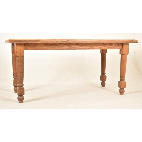 905 - A 19th century Victorian oak wood refectory farmhouse dining table. The table having a flared top wi... 