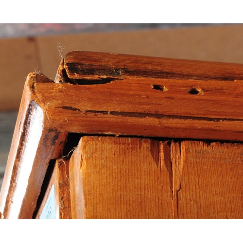 968 - A 19th century Victorian pine wardrobe. The wardrobe having pediment to top over central mirrored do... 