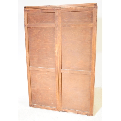 969 - Two 1930s Art Deco burr walnut wardrobe with tallboy. Having twin doors with bakelite and lucite han... 