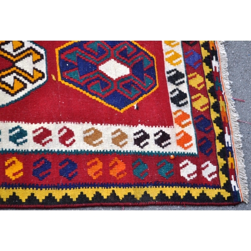 990 - A 20th century South West Persian Qashqai kilim carpet floor rug. The kilim featuring a red central ... 