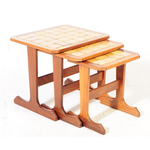 607 - G-Plan - British Modern Design - A retro mid 20th century circa 1970s teak framed & tiled top nest o... 