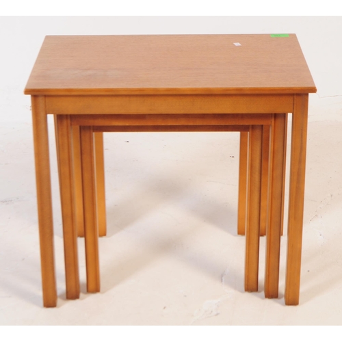 612 - British Modern Design - Retro mid 20th century teak nest of table. Rectangular form with tapering sq... 