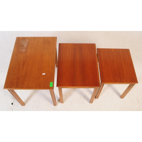 612 - British Modern Design - Retro mid 20th century teak nest of table. Rectangular form with tapering sq... 