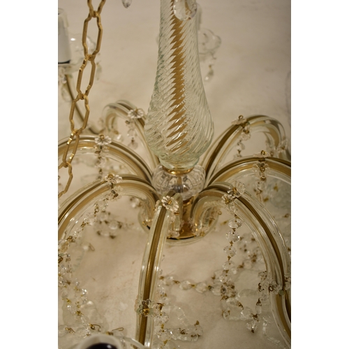 661 - A 20th century Italian Venetian Murano glass chandelier / electrolier. The ceiling light having cent... 