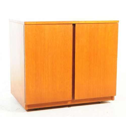 731 - British Modern Design - A mid 20th century circa 1960s teak music vinyl record cabinet having twin d... 