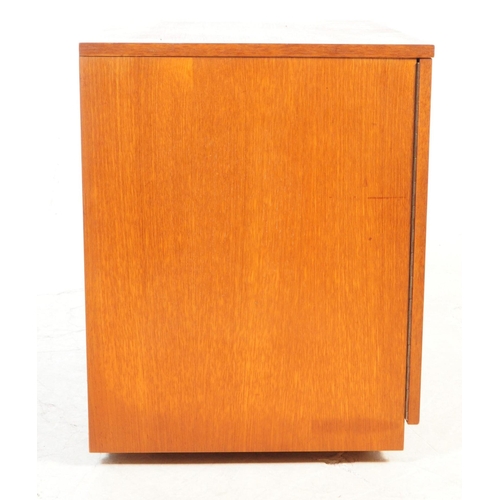 731 - British Modern Design - A mid 20th century circa 1960s teak music vinyl record cabinet having twin d... 