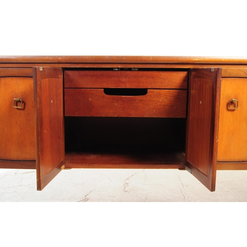 736 - Collector by Gomme - A mid 20th century Collector by Gomme teak wood sideboard credenza. The sideboa... 