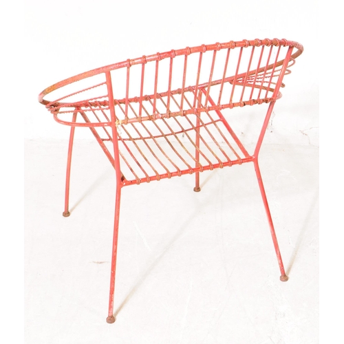 743 - A vintage 20th century painted wire metal garden outdoors chair and table painted in a red colourway... 