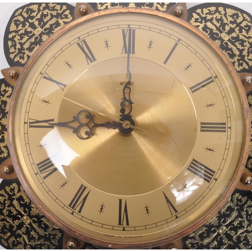 740 - Metamec - A 20th Century vintage Metamec wall clock having brass circular face with gilt decorated f... 