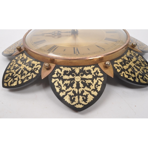 740 - Metamec - A 20th Century vintage Metamec wall clock having brass circular face with gilt decorated f... 