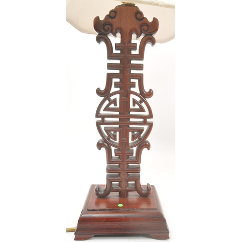 873 - Two 20th Century Chinese table lamps light, one having dark wood stand of Chinese characters sat upo... 