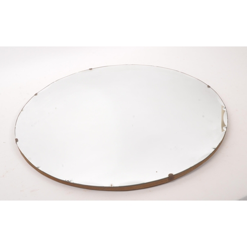 875 - A mid Century Art Deco style circular wall hanging mirror having patterned rounded bevelled edge des... 