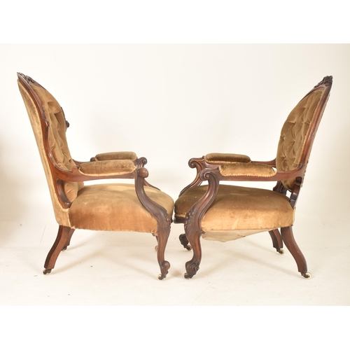 900 - A pair of Victorian 19th century mahogany framed & velvet upholstered button back His & Hers armchai... 