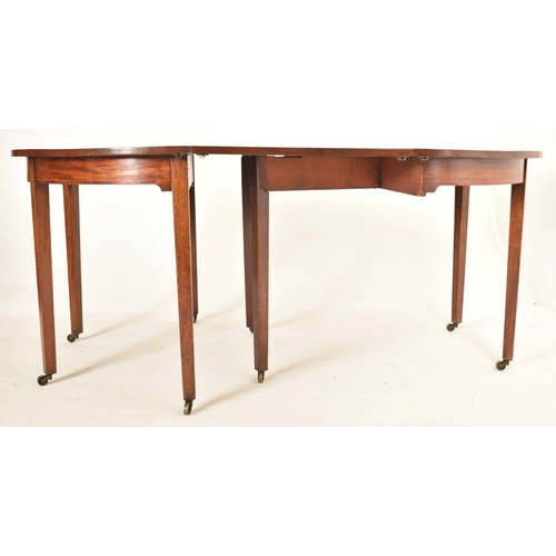 910 - A 19th century George III figured mahogany sectional extending D-end dining. The table having two ha... 