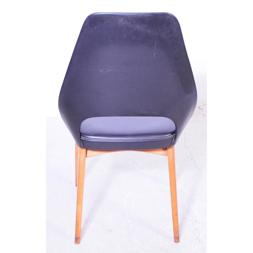 561 - Stoe Benchair - late mid 20th century black padded vinyl seat and backrest, raised on tapered suppor... 