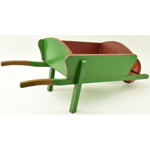 23 - Castrol - A vintage 20th century green painted advertising wooden wheelbarrow. The barrow with label... 