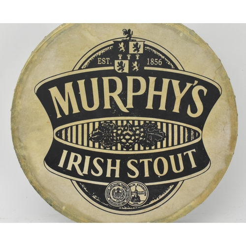 31 - Murphy's Irish Stout - a vintage 20th century Murphy's Irish Stout handheld advertising drum. The dr... 