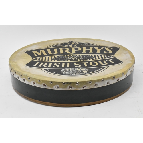 31 - Murphy's Irish Stout - a vintage 20th century Murphy's Irish Stout handheld advertising drum. The dr... 