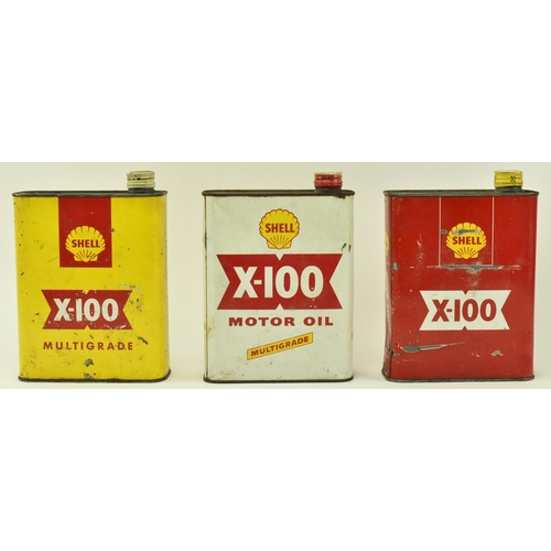 36 - Automobilia - Three vintage mid 20th century Shell X-100 motor oil cans. Each of typical form with o... 