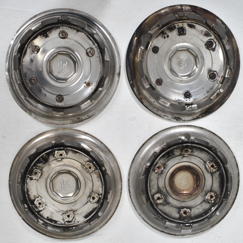 39 - Rolls Royce - a set of four vintage original Rolls Royce stainless steel car wheel hub caps with blu... 