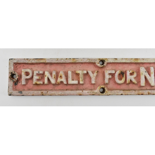 42 - Railwayana - A vintage 20th century cast iron railway notice sign. Slender rectangular form with rai... 