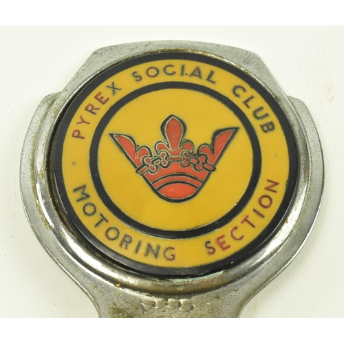 51 - Motoring interest - a vintage 20th century AA motorcycle chrome badge. Together with a Pyrex Social ... 