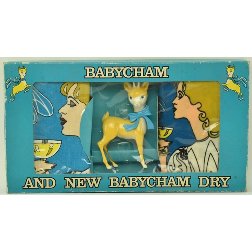 53 - Babycham - a vintage Babycham advertising gift set, along with three coupe wine glasses. The gift se... 