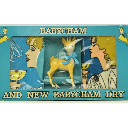 53 - Babycham - a vintage Babycham advertising gift set, along with three coupe wine glasses. The gift se... 