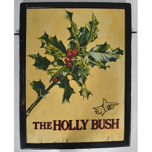 93 - Breweriana - a vintage 20th century double sided wooden painted pub / bar sign for The Holly Bush. T... 