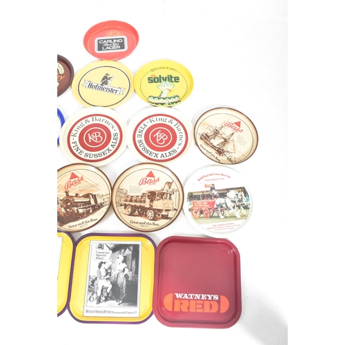 96 - Breweriana - a collection of eighteen vintage advertising enamel drinks trays.The lot comprising squ... 