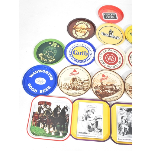 96 - Breweriana - a collection of eighteen vintage advertising enamel drinks trays.The lot comprising squ... 