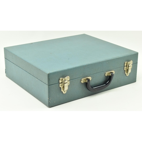 97 - Brexton - a vintage mid century circa 1950s motoring picnic set, presented in blue mock leather carr... 