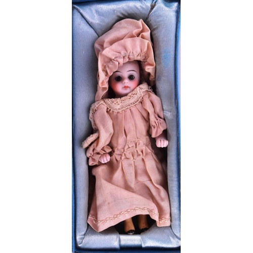 140 - Dolls - a miniature 19th Century German Kestner made bisque headed doll ' Yellow Boots '. The doll w... 