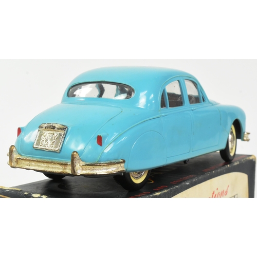 145 - Mettoy - a vintage Mettoy made battery operated electric Jaguar 2.4 Litre Saloon car. Turquoise plas... 