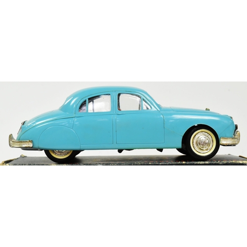 145 - Mettoy - a vintage Mettoy made battery operated electric Jaguar 2.4 Litre Saloon car. Turquoise plas... 