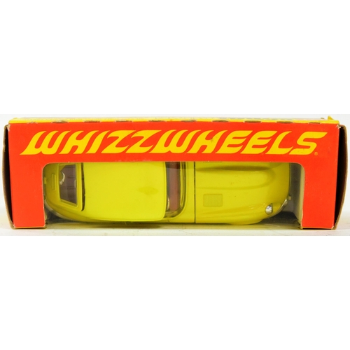 148 - Diecast - a vintage Corgi Whizzwheels diecast model No. 374 Jaguar 4.2 Litre E Type 2+2. Yellow mode... 