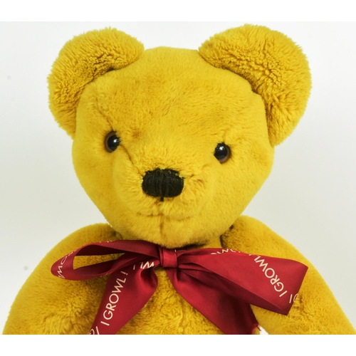 167 - Teddy Bears - a vintage Merrythought soft toy teddy bear with golden plush fur, fully jointed limbs,... 