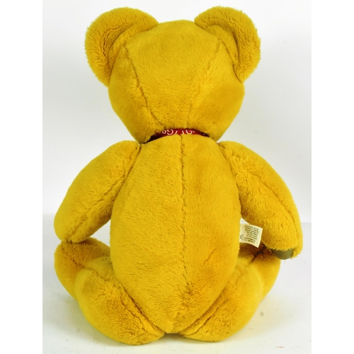 167 - Teddy Bears - a vintage Merrythought soft toy teddy bear with golden plush fur, fully jointed limbs,... 