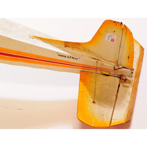 169 - Radio Controlled Plane - a vintage model RC plane fuselage and wings. Wooden construction, in yellow... 